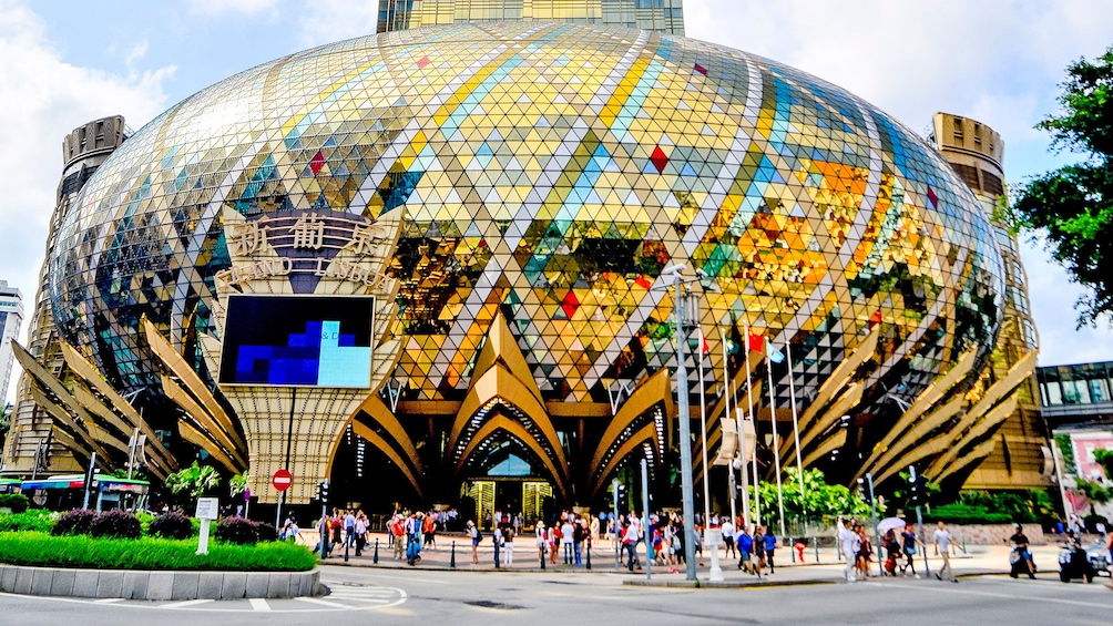 Show item 5 of 5. outside of the Grand Lisboa building in Macau