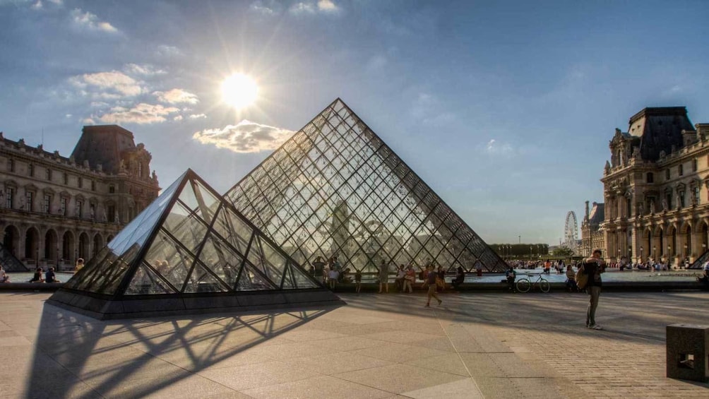 glass pyramid of the Louvre basking in the daylight in Paris