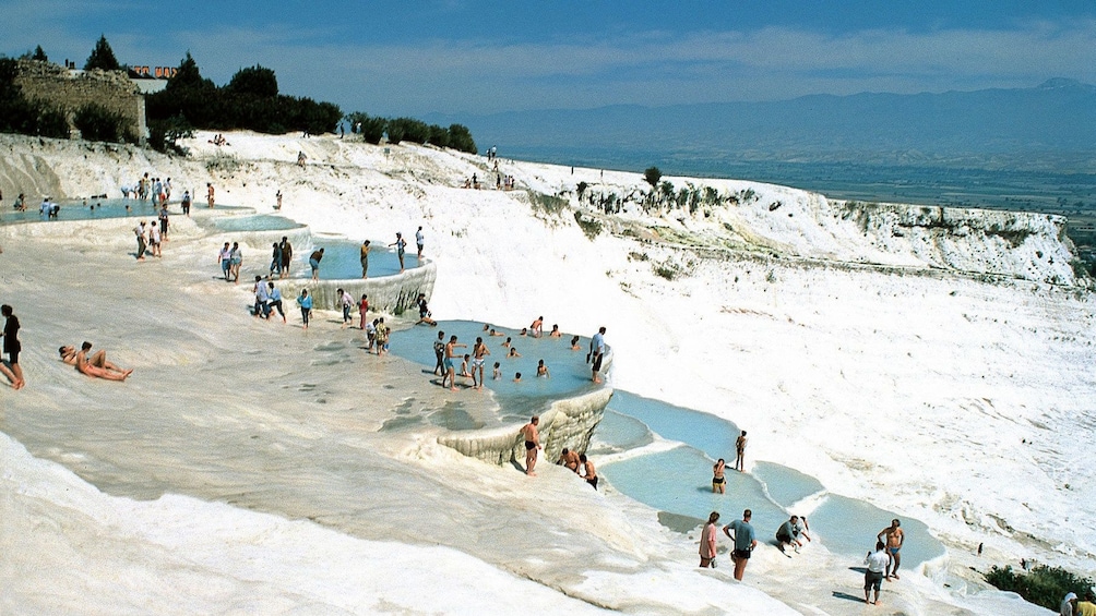 People relaxing in the hot springs of Pamukkale