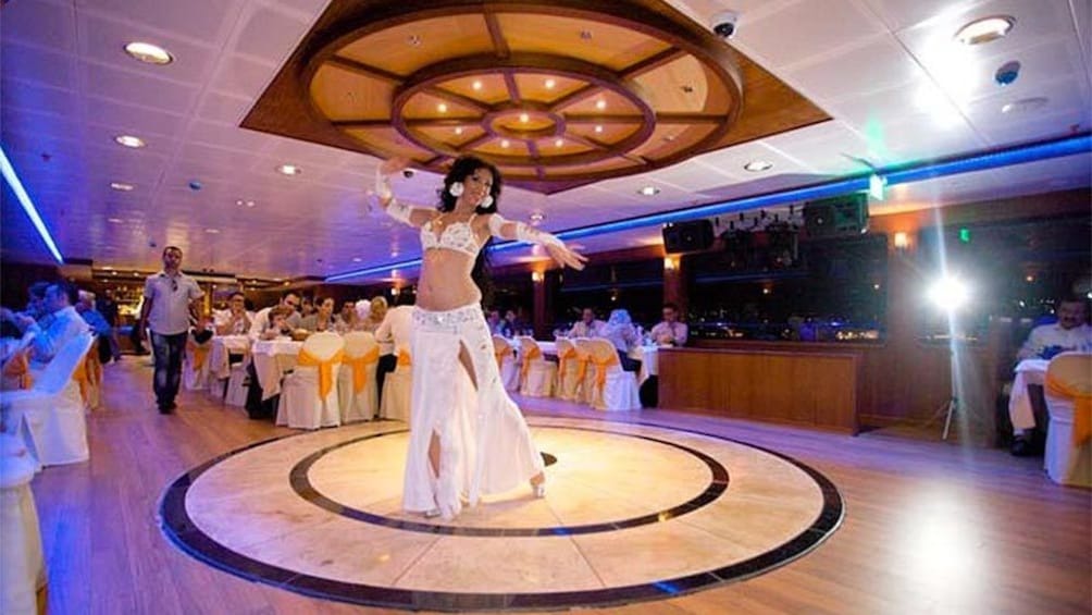 Woman performing a dance aboard the New  Year's Eve Dinner Cruise on Bosphorus in Turkey 
