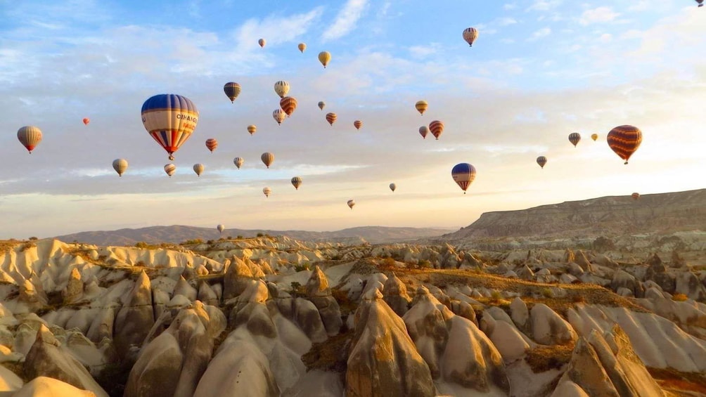 Many hot air balloons floating above Turkey 