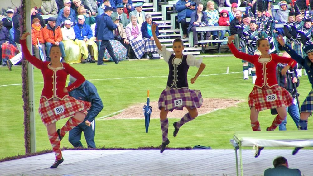 dance contestants in traditional outfits in Scotland
