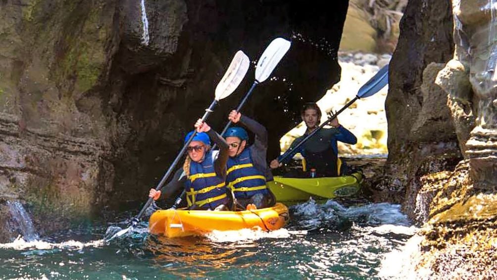 kayaking through a narrow gap in San Diego