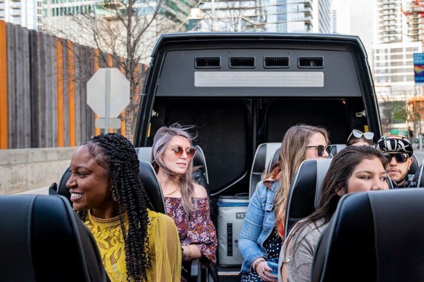 Group of passengers in the AO Tours Austin Panoramic Mercedes Mini-Bus