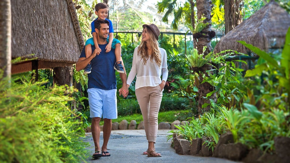 family walking through the zoo in Bali