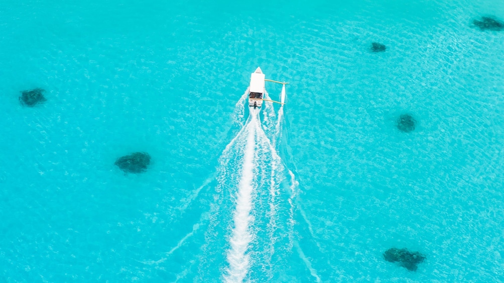 Aerial view of a boat on Bora Bora 