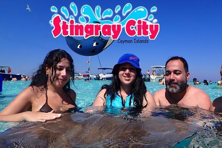 Stingray City adventure in Grand Cayman. Leading attractions in Grand Cayman. Tour also includes reef snorkeling and Starfish Point.