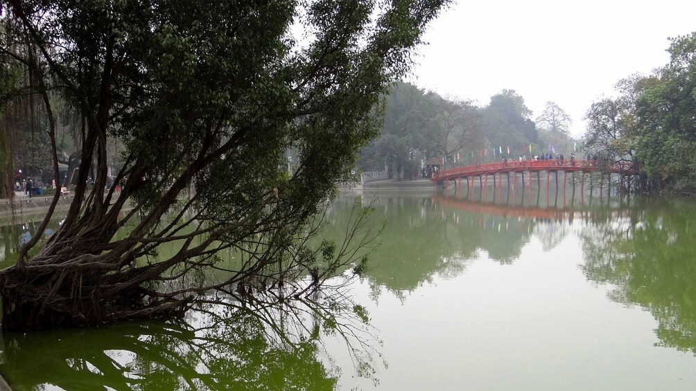 Distant view of the bridge over Hoan Kiem Lake in Hanoi