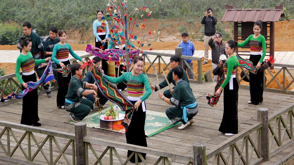 Locals performing a dance in the Mai Chau Valley in Vietnam 