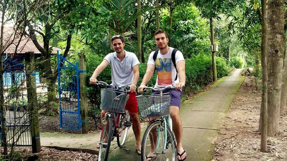men on bicycles in Vietnam