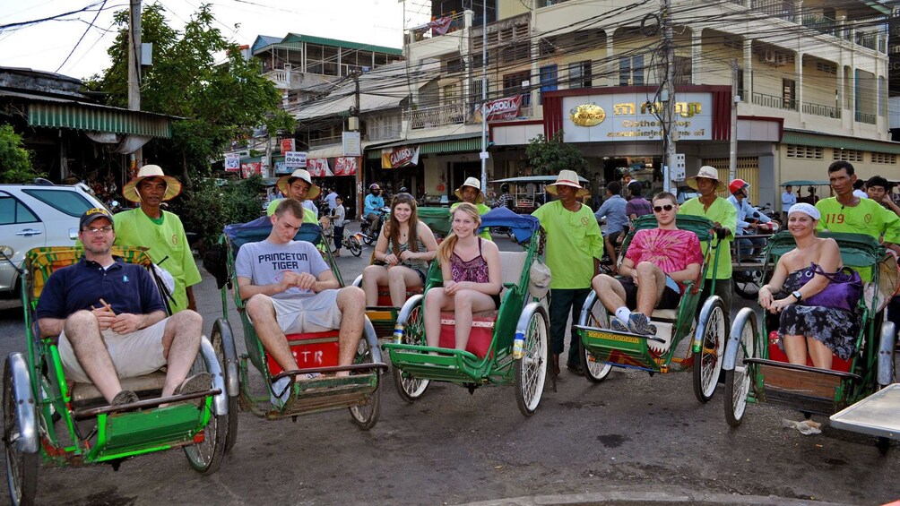 large group taking a cyclo ride in Vietnam