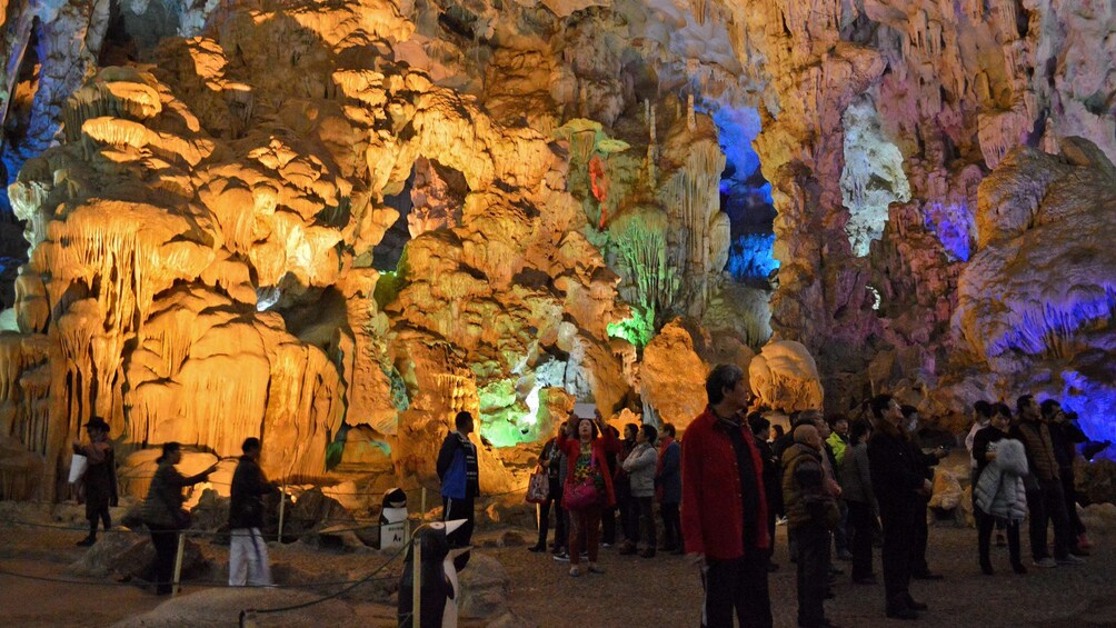 colorfully lit cave in Hanoi
