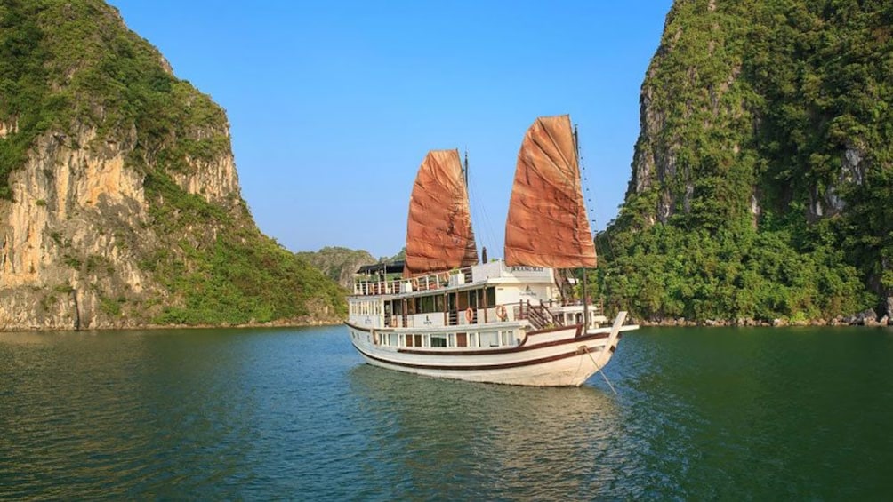 boat with red sails in Hanoi