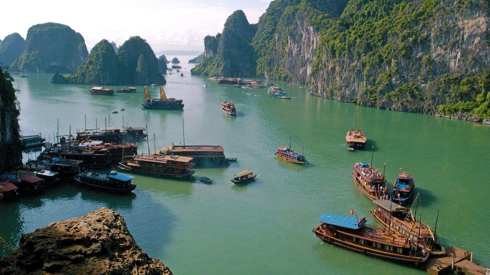 scattered boats in the water in Hanoi