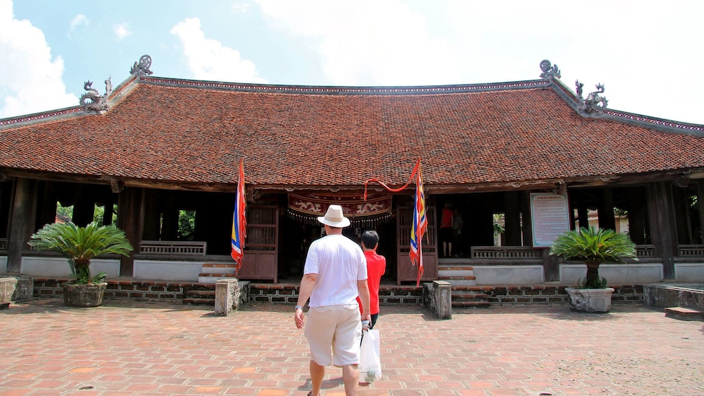 visiting a small temple in Hanoi