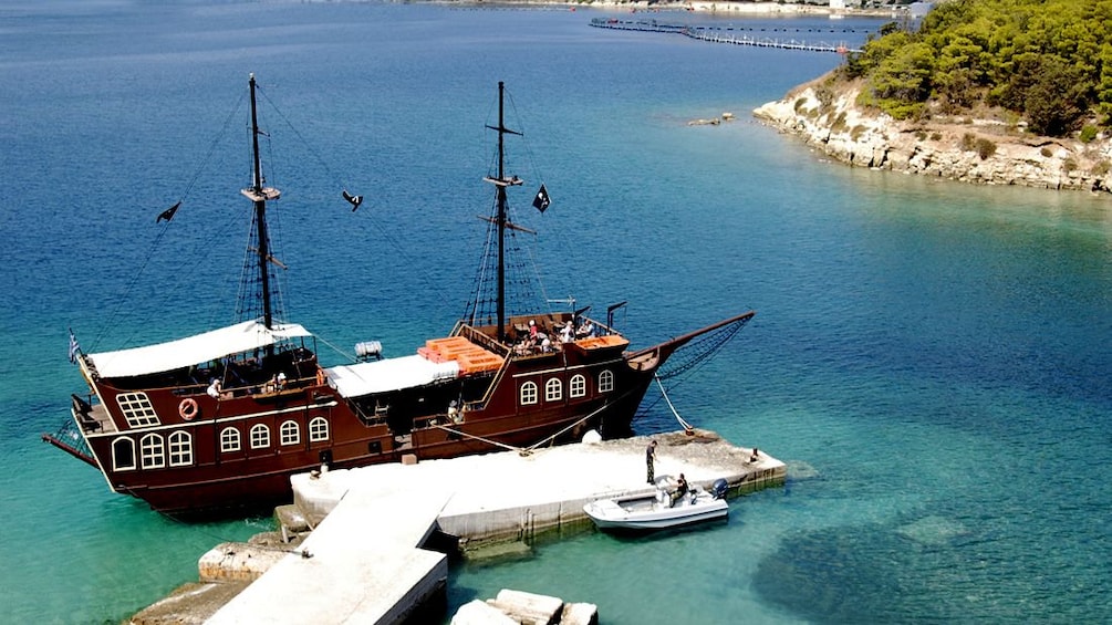 A Pirate ship anchored on a dock off the Greek coast. 