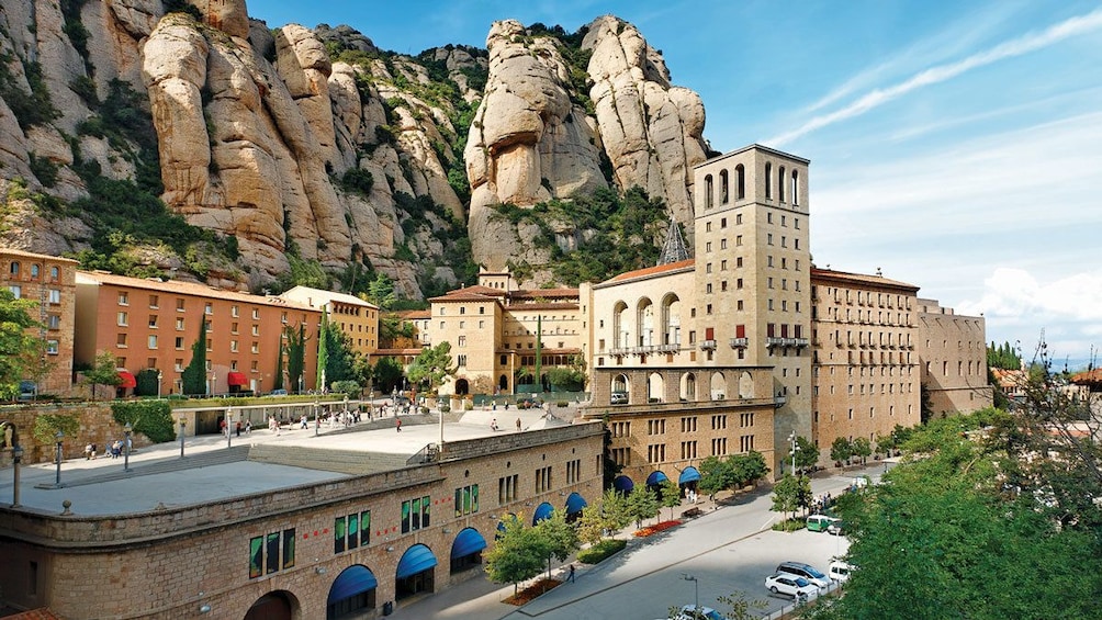 visitors exploring the Santa Maria de Montserrat Abbey in Barcelona