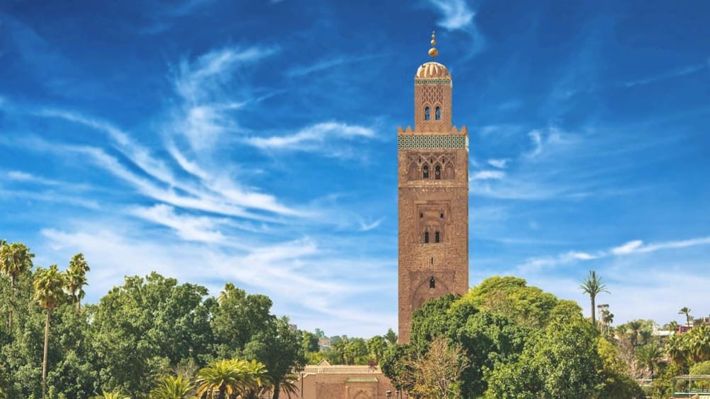 Landscape view of Marrakesh with mosque tower visible.