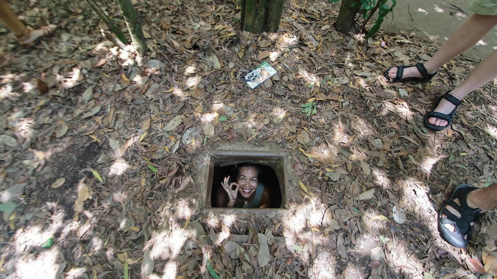Woman on the  Cu Chi Tunnels tour in Vietnam 