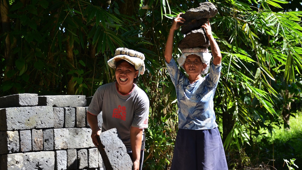Show item 3 of 9. Pair of native women at a sand quarry in Bali