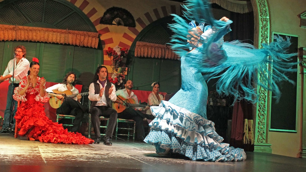 Dancer in elaborate blue dress