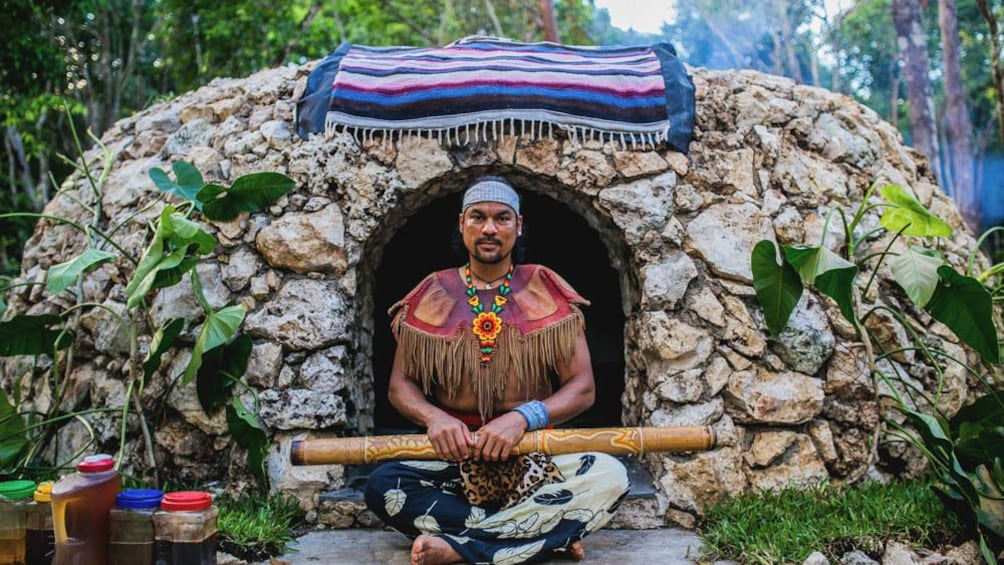 Show item 5 of 5. Man pictured wearing tribal wear.