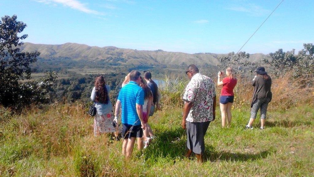 Tour group at a scenic lookout in Fiji