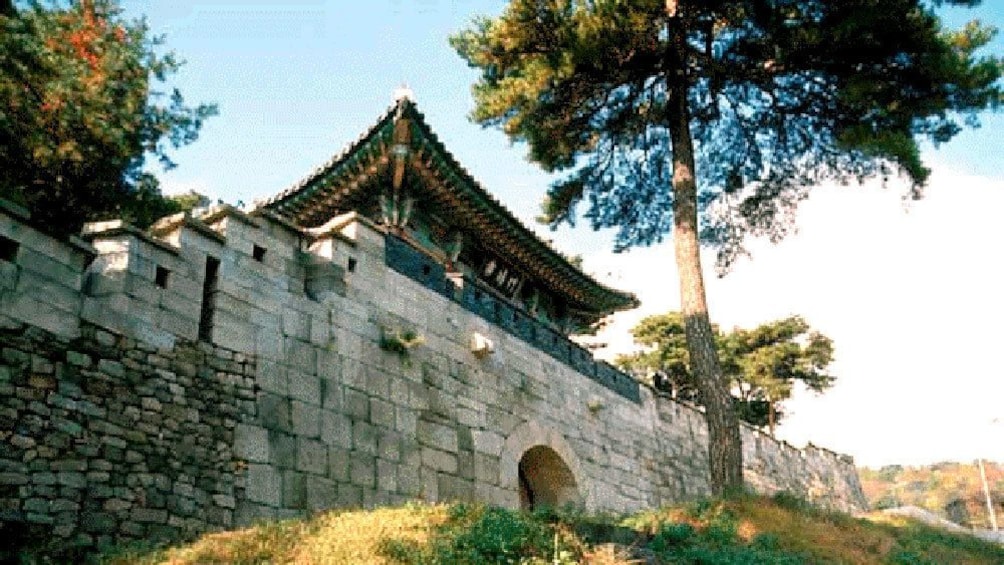 an arched entrance of the Kukaksan Fortress in Korea