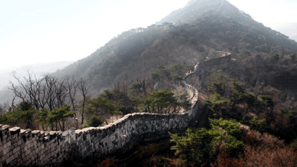 fortress walls along the mountains at the Kukaksan Fortress in Korea