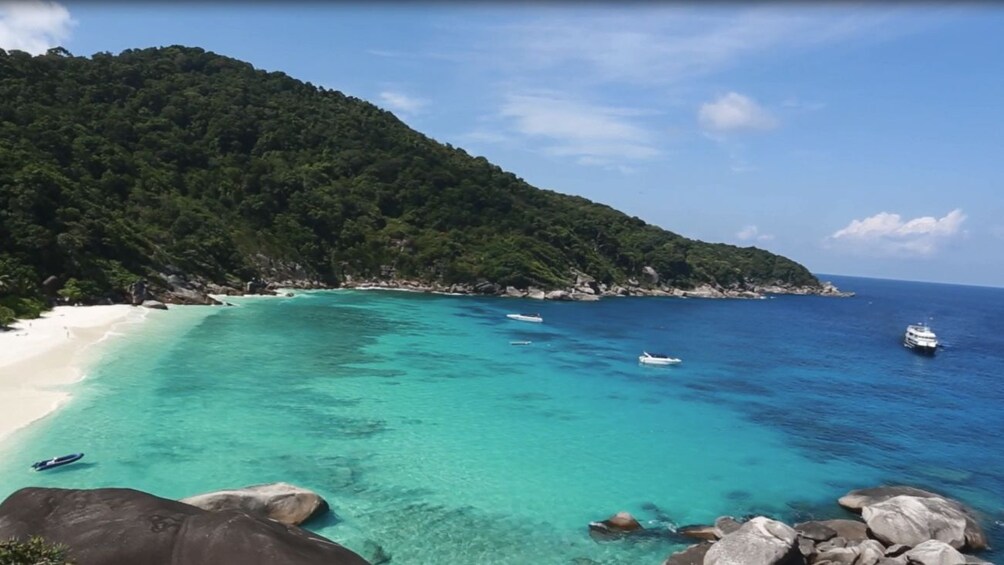 Beach view of island during clear day.