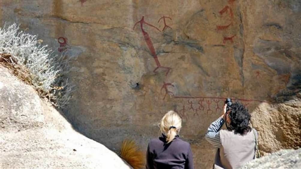 taking photos of cave paintings in Argentina