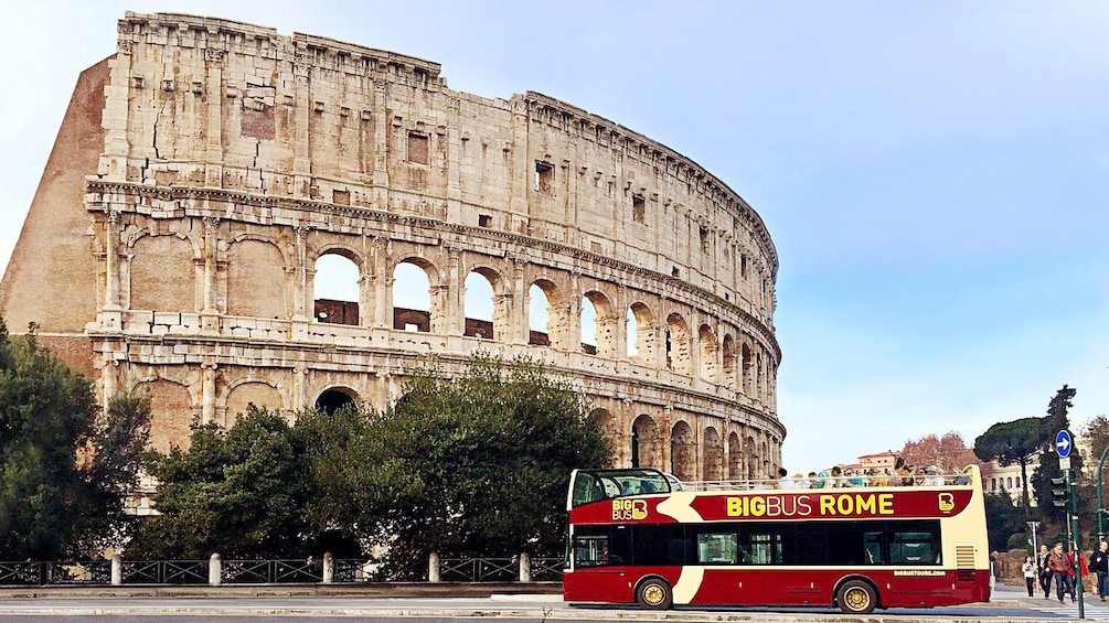 Hop-on Hop-off bus at the Colosseum in Rome