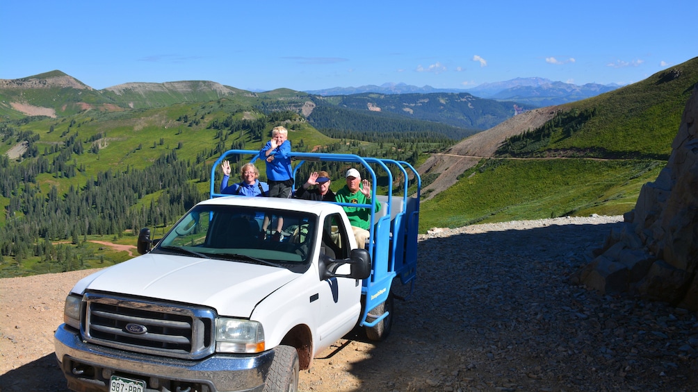 Tour group on a dirt road in the mountains in Denver