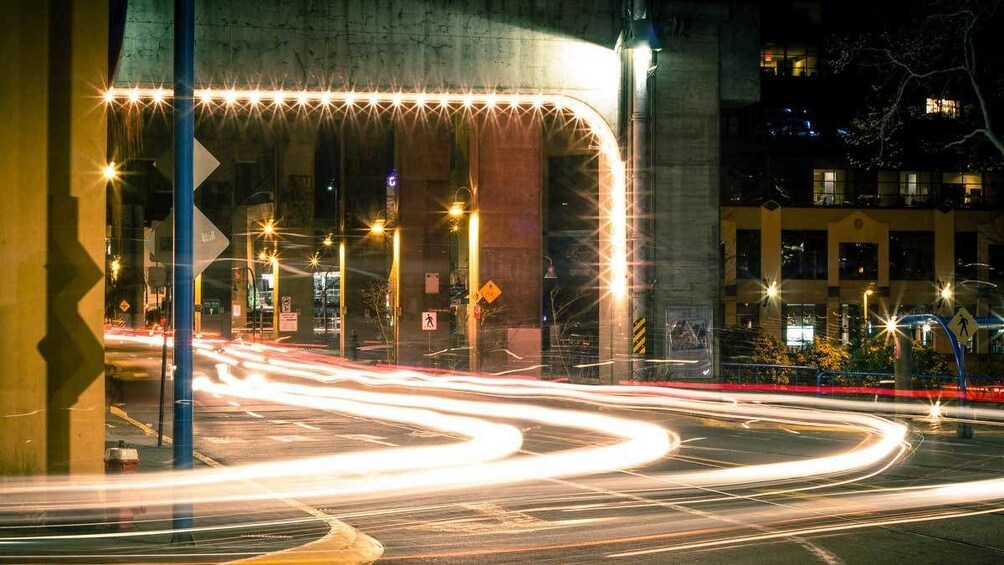 Show item 3 of 8. Street view of Granville Island at night in Vancouver, BC