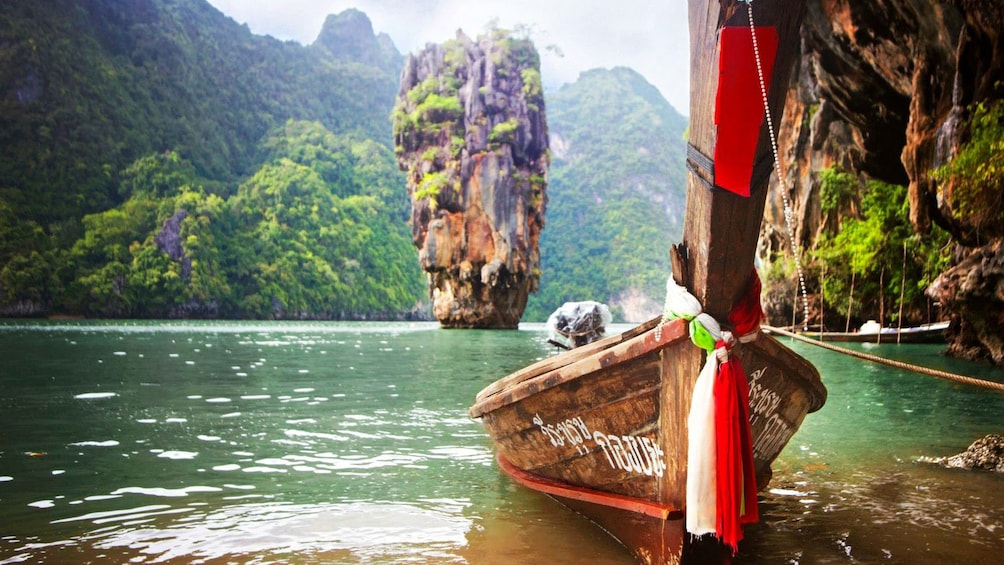 boat at shore near landmark