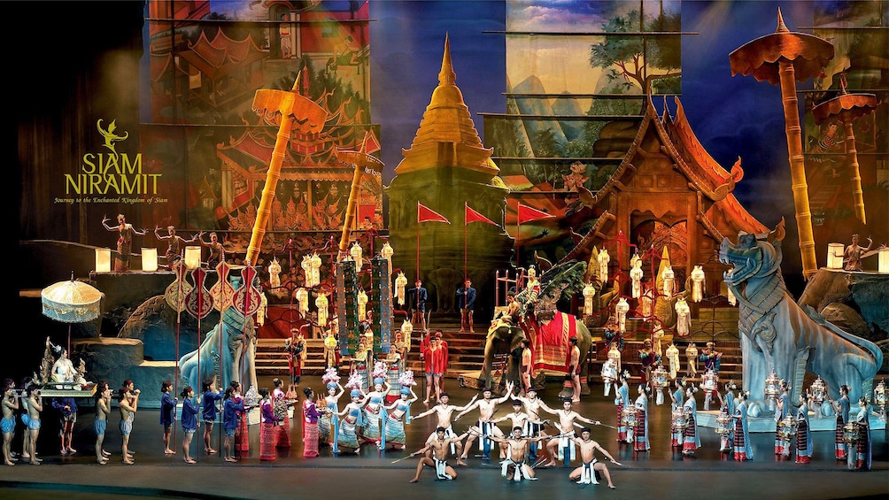 Lataa valokuva 1 kautta 4. Stage view of the all the performers at the Siam Niramit Show Bangkok