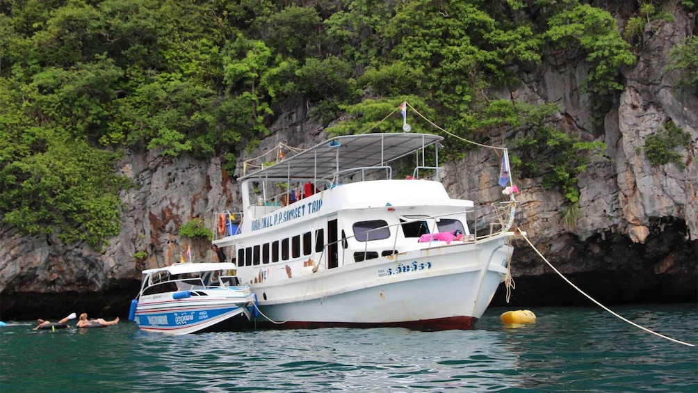 Tourists enjoying the Phi Phi Island tour in Phuket, Thailand