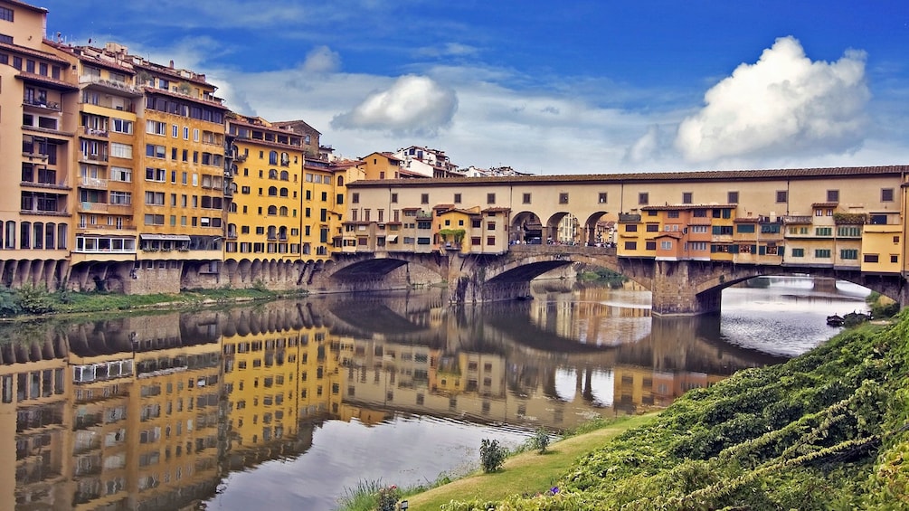 bridge over river and city view in italy