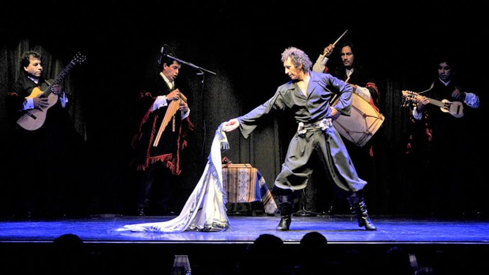 dancer performing with a sheet of cloth in Argentina