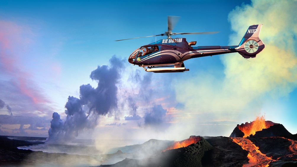 Show item 3 of 9. Helicopter flying over active volcano on the Big Island of Hawaii