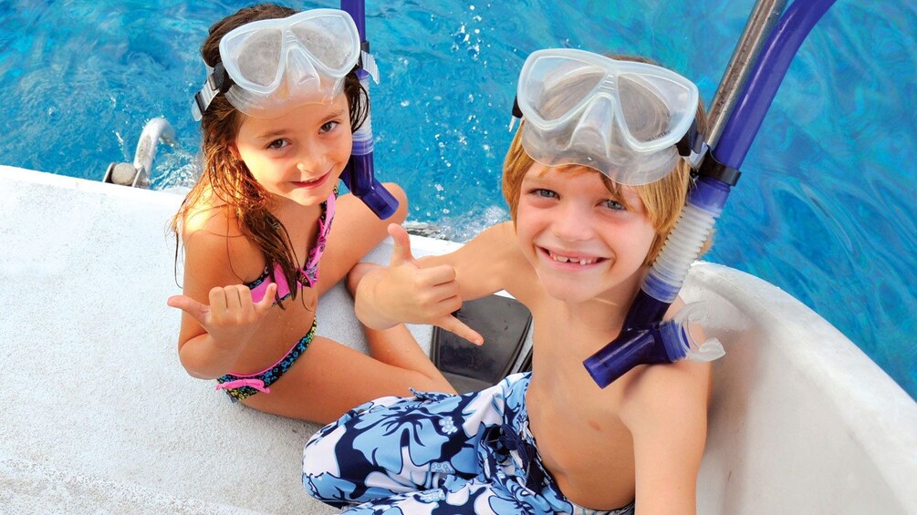Show item 2 of 8. Small children on the Lanai Snorkel Dolphin Sighting in Maui