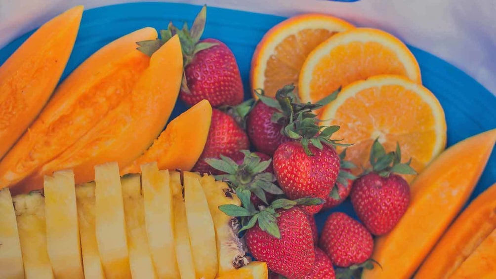 tray of sliced fruit in hawaii