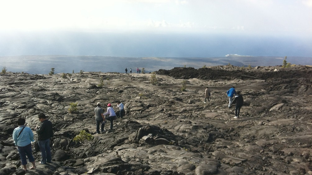 Tourists on the kaka Falls & Kilauea Volcano in Hawaii 