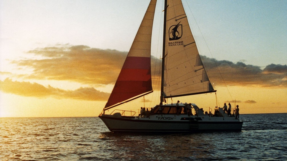 Sailboat at sunset on Big Island