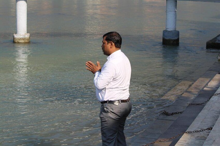 Making prayer to Holy Ganga