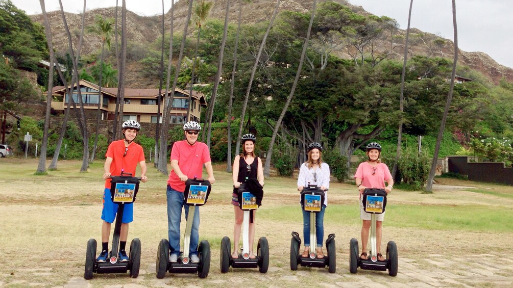Family learning to ride a Segway in Oahu