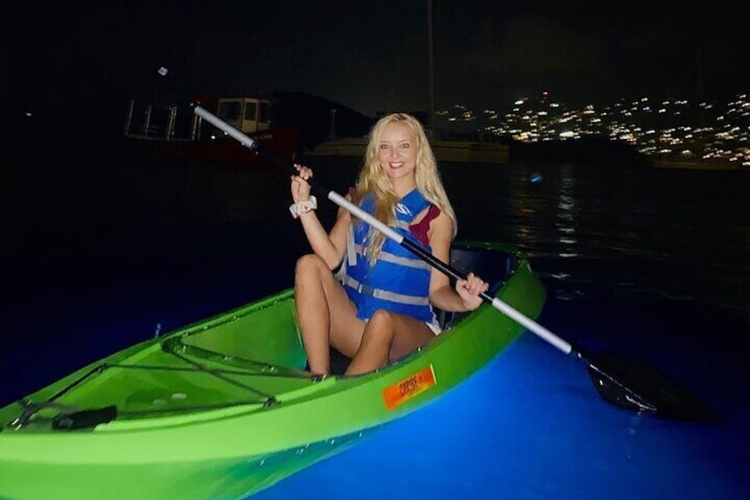 Aryanna enjoying Kayak After Dark with Charlotte Amalie Harbour in the background