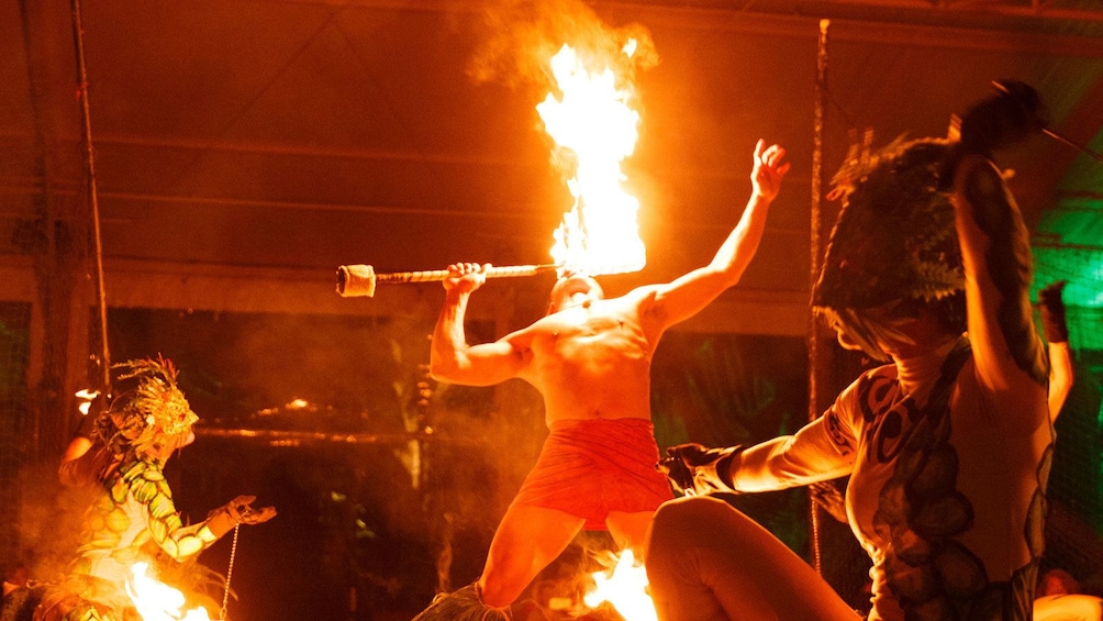 performer breathing fire at luau in Kauai