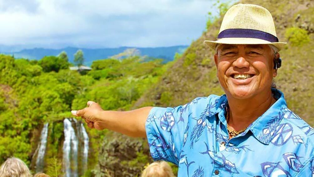 Close up of man pointing at beautiful view on the distance.