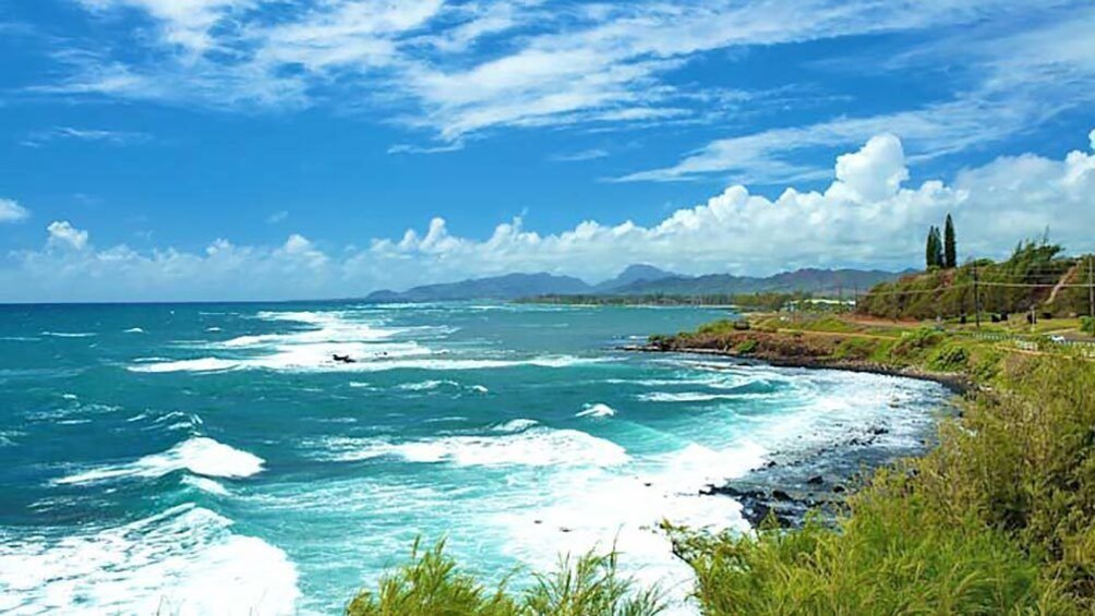 Aerial view of ocean during beautiful day.